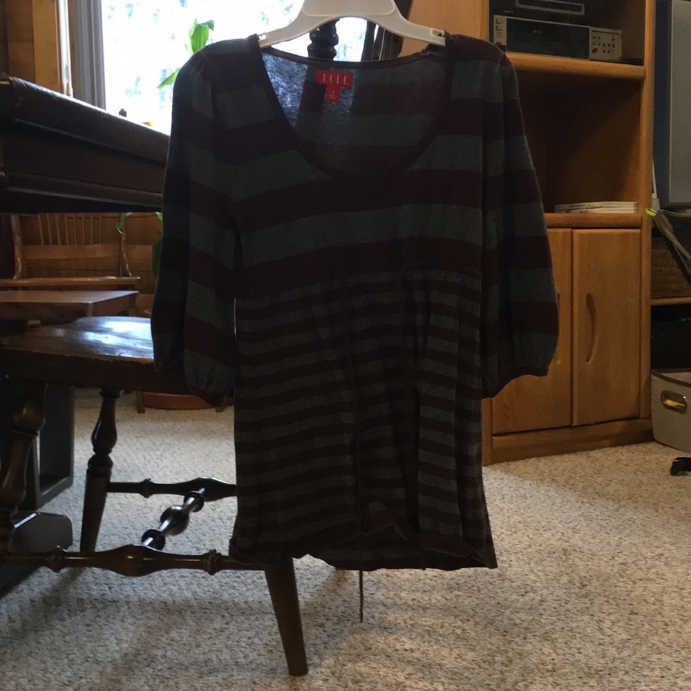 Gray and brown shirt.